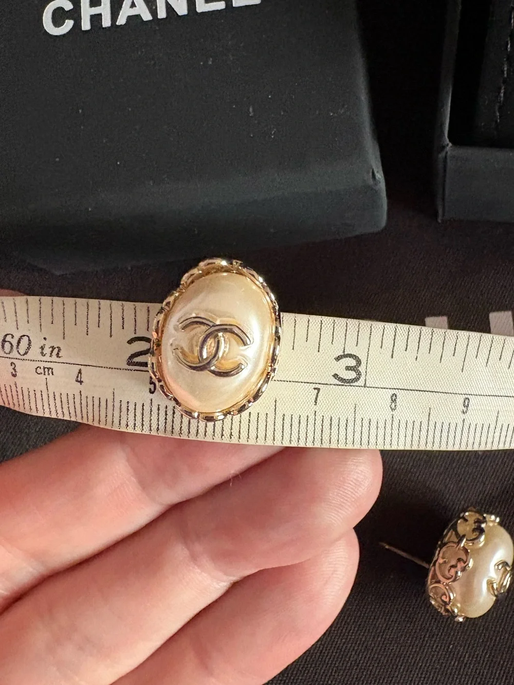 CHANEL Pearl Gold tone  Logo Stud Earrings barely used new condition.